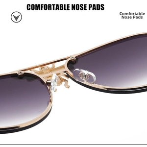 Macro view of gold metal sunglasses frame with purple lenses and comfortable nose pads
