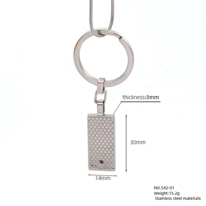 Detail of square stainless steel keychain pendant with small black stone and dimensions