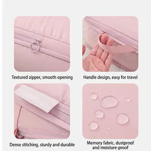 Pink memory fabric travel storage bag with waterproof zippers and sturdy handles
