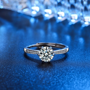Elegant silver V-shaped ring with six-prong solitaire diamond and sparkling zircon accents