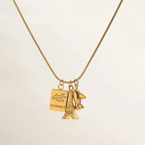 Detail of 18K gold stainless steel necklace with passport and Eiffel Tower pendants