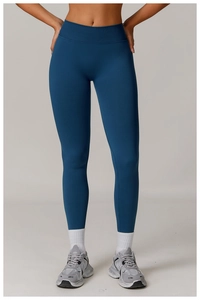 Close-up of seamless high-waist fitness leggings in deep blue with elastic compression