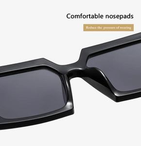 Détail des plaquettes de nez intégrées confortables sur une monture de lunettes de soleil carrée