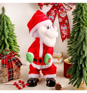 Musikalische tanzende Weihnachtsmann-Puppe mit festlichen Bäumen und Geschenkdeko