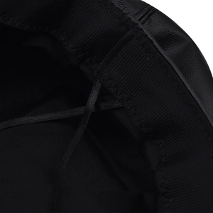 Close-up of PU leather beret interior with fabric sweatband and adjustable drawstring