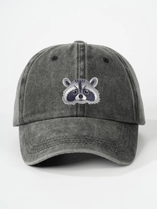 Close-up of raccoon embroidery on vintage washed cotton baseball cap in dark grey color