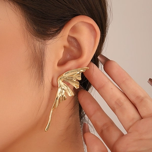 Minimalist liquid metal butterfly wing earrings with asymmetric gold textured design