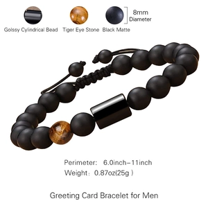 Men's matte black beaded bracelet with tiger eye stone and detailed size specifications