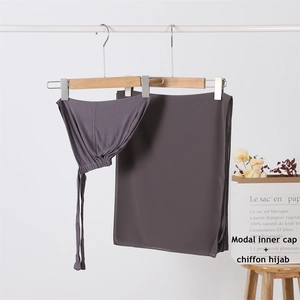 Dark grey modal inner cap and chiffon hijab set displayed on a minimalist hanger