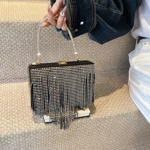Luxury black evening clutch with sparkling silver rhinestone tassels and pearl handle