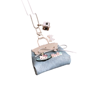 Mini denim Hello Kitty bag pendant necklace with silver chain and cartoon design