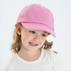 Detailed close-up of a pink cotton baseball cap for girls with curved brim and eyelets