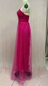 Detail of rose red strapless maxi dress with sparkling sequins and layered mesh tulle skirt