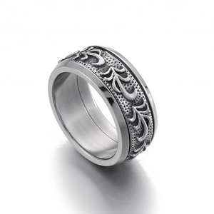 Vintage titanium steel ring for men featuring intricate embossed floral textures and silver finish