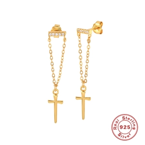 Detail of 925 sterling silver gold-plated tassel cross earrings with sparkling zircon