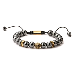 Handmade hematite beaded bracelet with golden accents and adjustable black cord