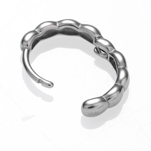 Minimalist silver wavy hoop earrings with bubble texture in polished stainless steel