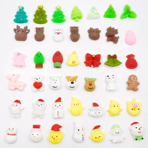 Detailed view of assorted Christmas TPR squishy toys including reindeer and snowman