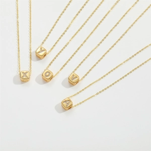 Delicate gold square initial necklaces with sparkling cubic zirconia letter pendants