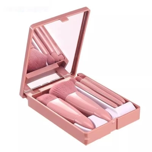 Portable 5-piece pink makeup brush set with mirror storage case for travel and touch-ups