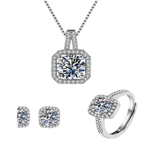Three-piece silver jewelry set with square-cut clear crystals and halo diamond setting