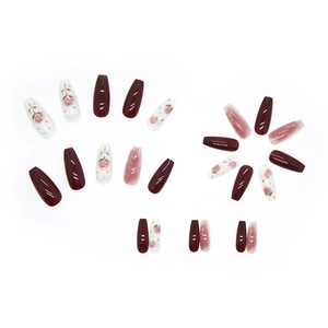 Glossy long coffin press-on nails set in reddish-brown, rose floral art and marble patterns