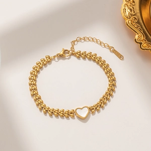 18K gold plated titanium steel wheat link bracelet with a white heart shell inlay