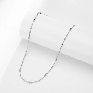 Minimalist S925 sterling silver necklace with textured cylindrical metal beads on white display