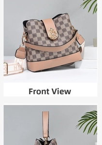 Vista frontale dettagliata della borsa a secchiello vintage da donna con motivi monogramma