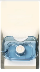 Detail view of portable shampoo basin with soft headrest and drainage hose for bed use