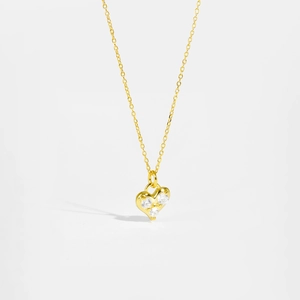 Elegant gold S925 sterling silver heart necklace featuring three sparkling zircons