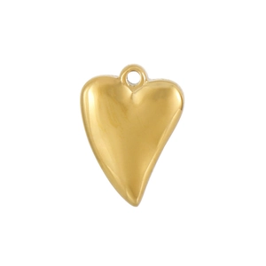 Close-up of heart-shaped gold titanium steel pendant with polished metallic surface