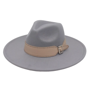 Detailed close-up of wide brim grey fedora with camel leather belt and silver buckle