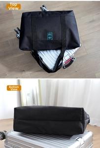 Detail of travel bag trolley sleeve attached to luggage and reinforced bottom stitching