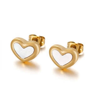 Elegant gold heart earrings with white mother-of-pearl insets on a clean white background