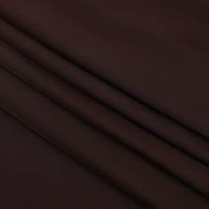 Detailed texture of dark brown satin fabric with elegant drape and diagonal folds