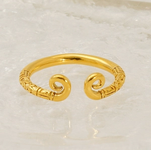 Macro shot of 18K gold plated Sun Wukong ring featuring intricate vintage cloud patterns