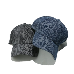 Blue and grey striped baseball caps with unique leaf vein patterns on curved brim hats