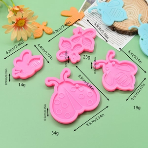 Pink silicone insect molds for DIY resin and crafts featuring bee and ladybug designs
