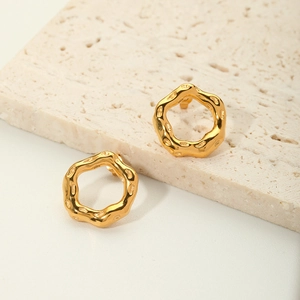 Irregular geometric lava earrings in 18K gold plated stainless steel on a stone base
