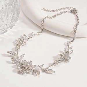 Silver leaf flower necklace with diamonds, elegant botanical design for women