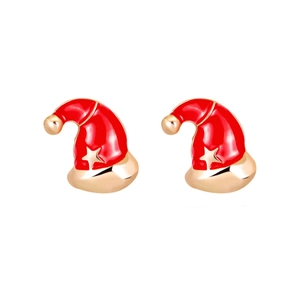 Close-up of festive red and gold Christmas hat stud earrings with glossy finish