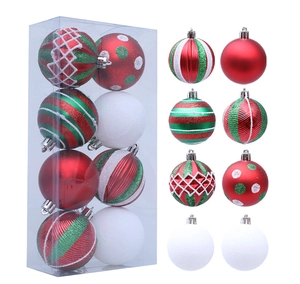 Close-up of red, green and white Christmas balls with stripe and dot patterns in gift box