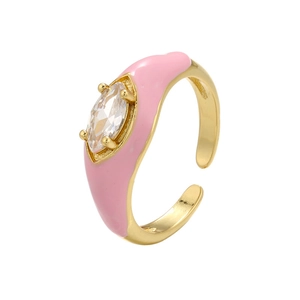 Macro shot of pink enamel ring with marquise-cut cubic zirconia and gold plating
