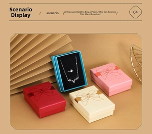 Detailed view of assorted jewelry gift boxes featuring elegant bow ribbon prints