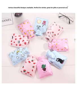 Detail view of colorful cartoon PVC hot water bottles with cute fruit and animal patterns