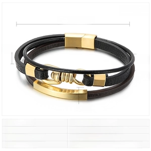 Vue détaillée du bracelet en cuir tressé multicouche avec fermoir magnétique doré