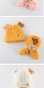 Detailed view of plush bear ears and soft thermal fleece texture on kids' hats