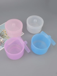 Detailed view of 4-color manicure cleaning boxes with internal straining mesh trays