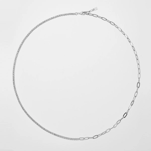 Detail of S925 silver necklace with sparkling zirconia tennis chain and paperclip links